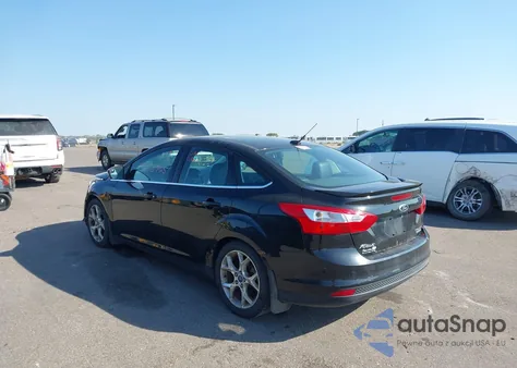 2014 Ford Focus Titanium from USA, damaged, VIN 1FADP3J23EL237429